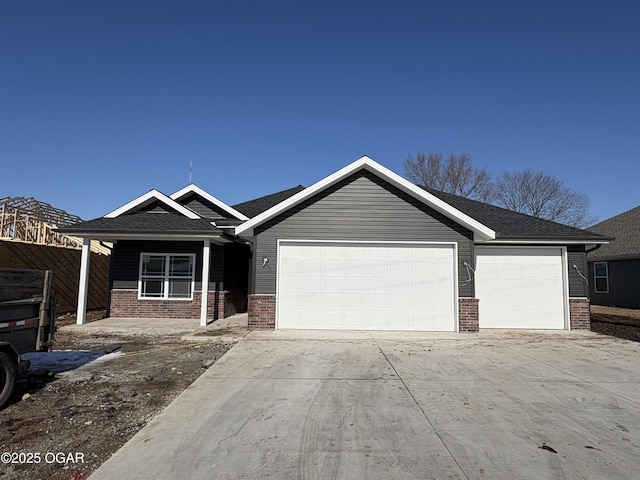 view of front of property with a garage