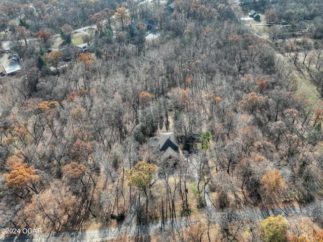 5623 Rivercrest Valley Dr, Joplin, MO 64804 - aerial view of property and surrounding area with a heavily wooded area