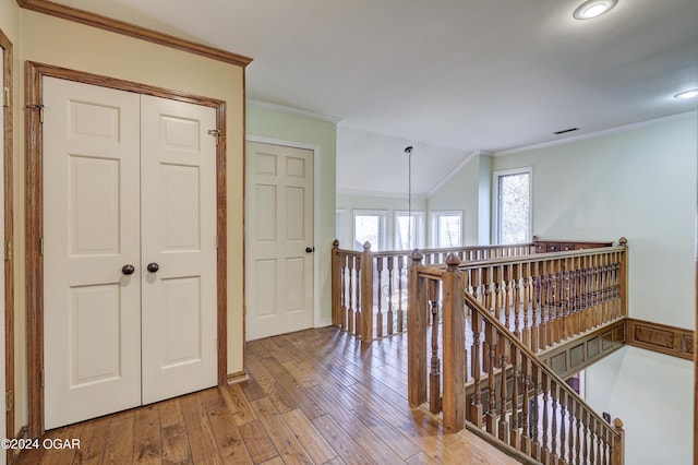 5623 Rivercrest Valley Dr, Joplin, MO 64804 - hall featuring an upstairs landing, crown molding, hardwood / wood-style floors, lofted ceiling, and recessed lighting