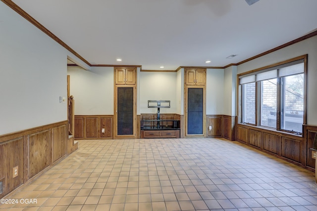 5623 Rivercrest Valley Dr, Joplin, MO 64804 - unfurnished living room featuring wainscoting, crown molding, recessed lighting, and light tile patterned flooring
