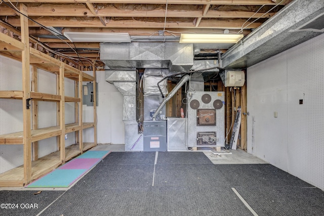5623 Rivercrest Valley Dr, Joplin, MO 64804 - unfinished below grade area featuring electric panel and heating unit