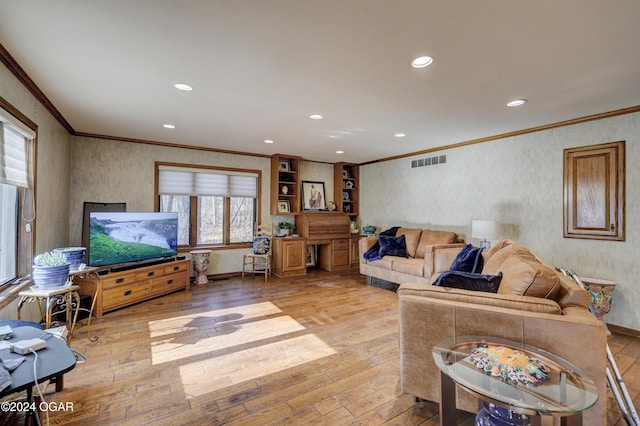 5623 Rivercrest Valley Dr, Joplin, MO 64804 - living area with ornamental molding, light wood-style floors, and recessed lighting