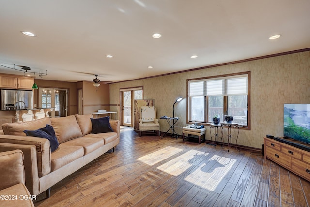 5623 Rivercrest Valley Dr, Joplin, MO 64804 - living room featuring wood-type flooring, ceiling fan, ornamental molding, and recessed lighting