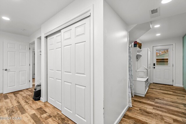 hall featuring hardwood / wood-style flooring