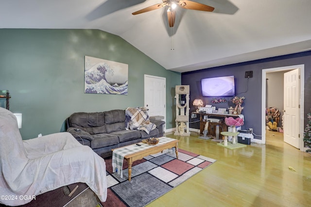 living room with ceiling fan, wood-type flooring, and vaulted ceiling