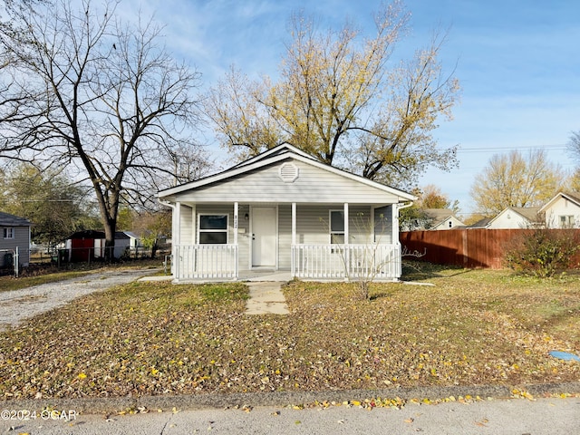 bungalow-style house featuring covered porch