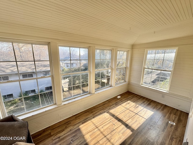 unfurnished sunroom with vaulted ceiling and wood ceiling