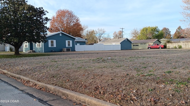 view of yard with central air condition unit