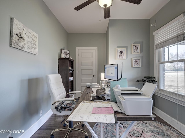 home office featuring ceiling fan and dark wood-type flooring