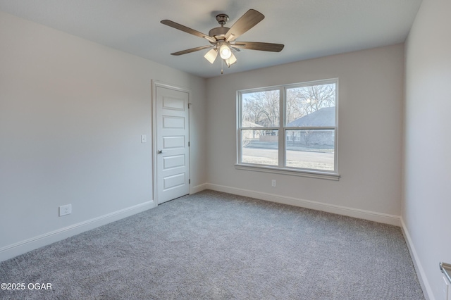 unfurnished room featuring carpet floors and ceiling fan