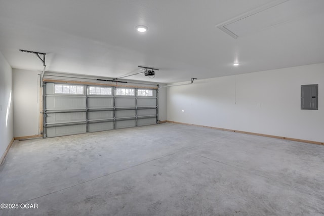 garage with electric panel and a garage door opener