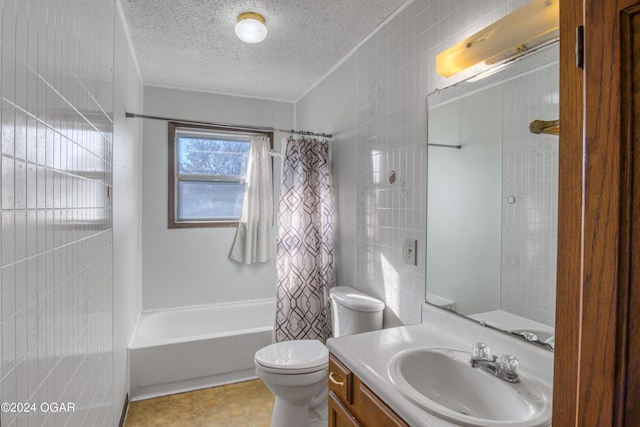 full bathroom featuring shower / tub combo, vanity, a textured ceiling, and toilet