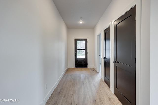 doorway featuring light hardwood / wood-style flooring