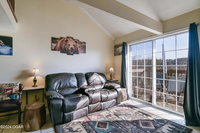 living room featuring lofted ceiling and light tile patterned floors