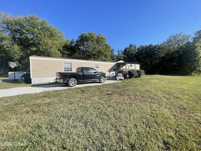 exterior space featuring a front yard