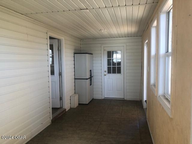 hallway with wood ceiling