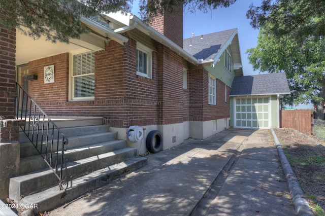 view of property exterior featuring a garage