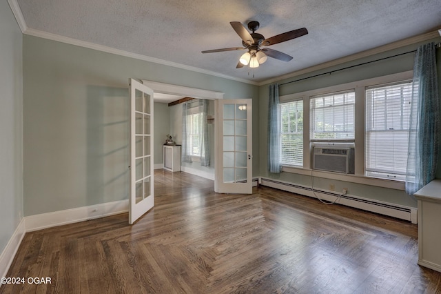 unfurnished room with hardwood / wood-style floors, french doors, crown molding, a textured ceiling, and baseboard heating