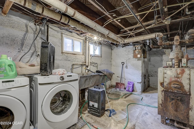 laundry room with washer and dryer