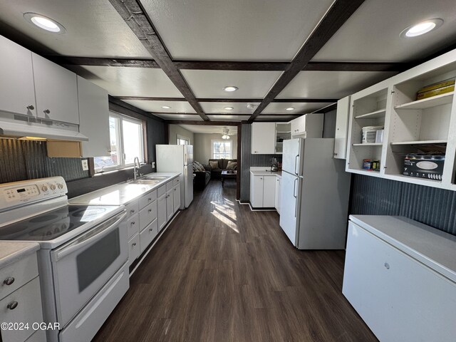 kitchen with white cabinets, dark hardwood / wood-style flooring, white appliances, and coffered ceiling