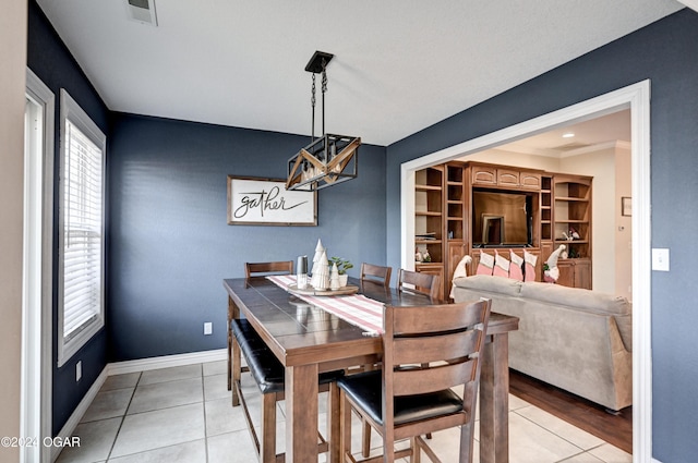 dining space with light tile patterned flooring