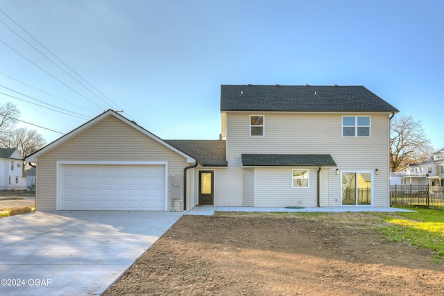 view of front of house with a garage