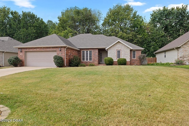 ranch-style home with a garage and a front lawn