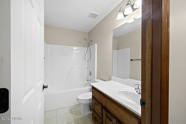 full bathroom with toilet, vanity, tile patterned floors, and tub / shower combination