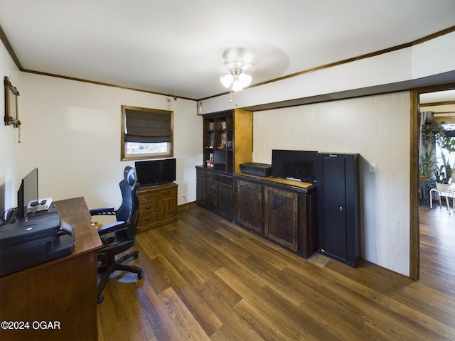 home office featuring dark hardwood / wood-style floors, ceiling fan, and ornamental molding