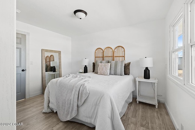 bedroom featuring light hardwood / wood-style floors