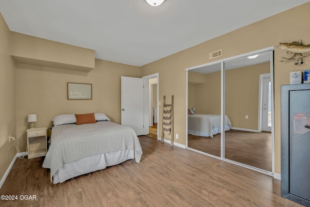 bedroom featuring hardwood / wood-style floors