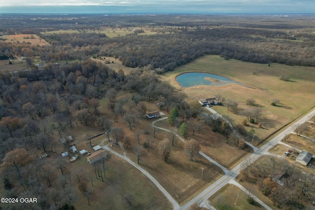 birds eye view of property featuring a rural view