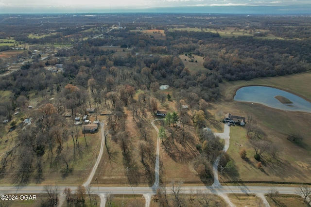 drone / aerial view with a rural view and a water view