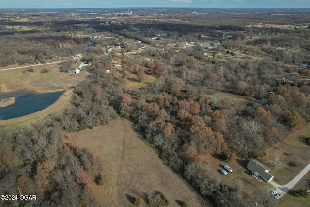 birds eye view of property with a rural view