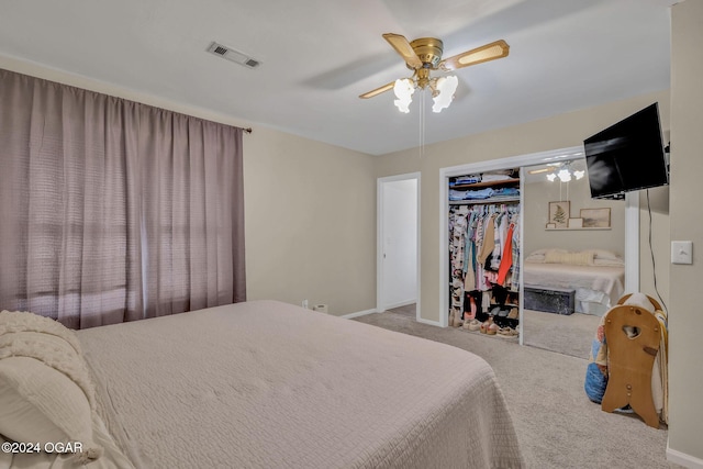 bedroom with light carpet, a closet, and ceiling fan