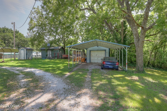 view of yard featuring a garage, a shed, and a carport