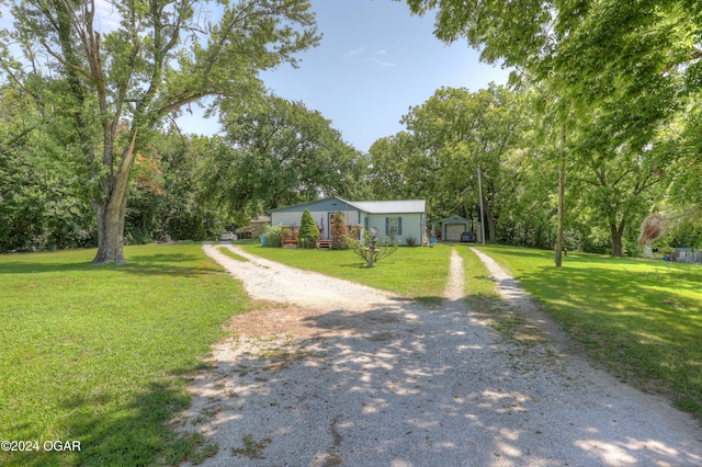 ranch-style house with a front yard