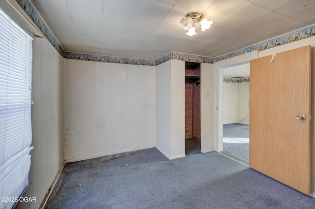 empty room with carpet flooring