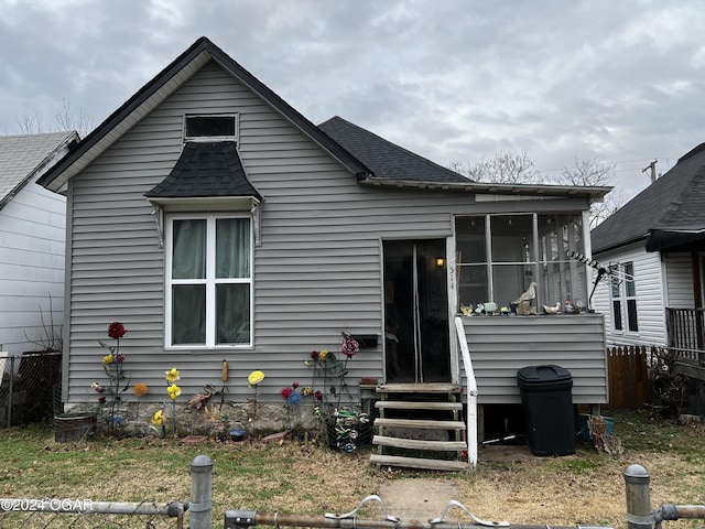 514 Washington St, Galena, KS 66739 - rear view of house featuring a sunroom