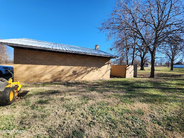118 S Oak St, Mulberry, KS 66756 - view of side of property with a yard