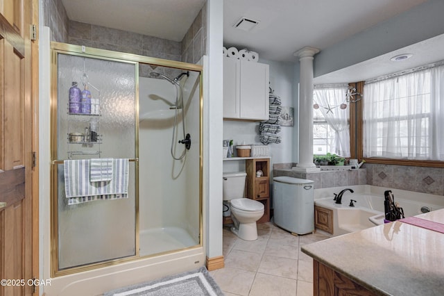 full bathroom featuring toilet, shower with separate bathtub, vanity, and tile patterned floors