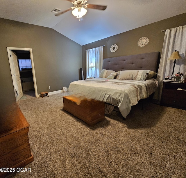 bedroom with carpet, ceiling fan, and vaulted ceiling