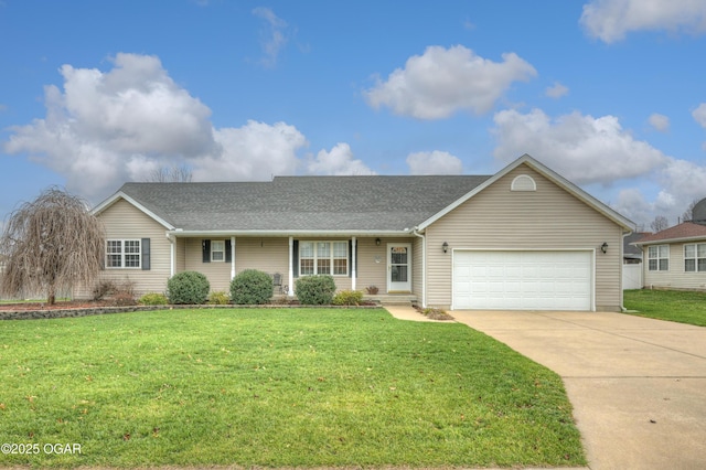 ranch-style house featuring a garage and a front lawn