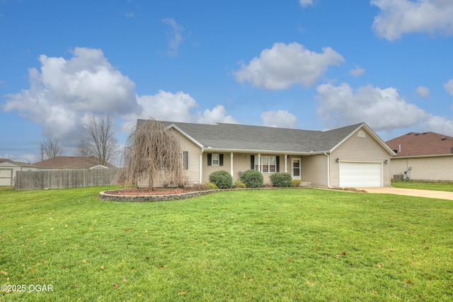 ranch-style home featuring a garage and a front lawn