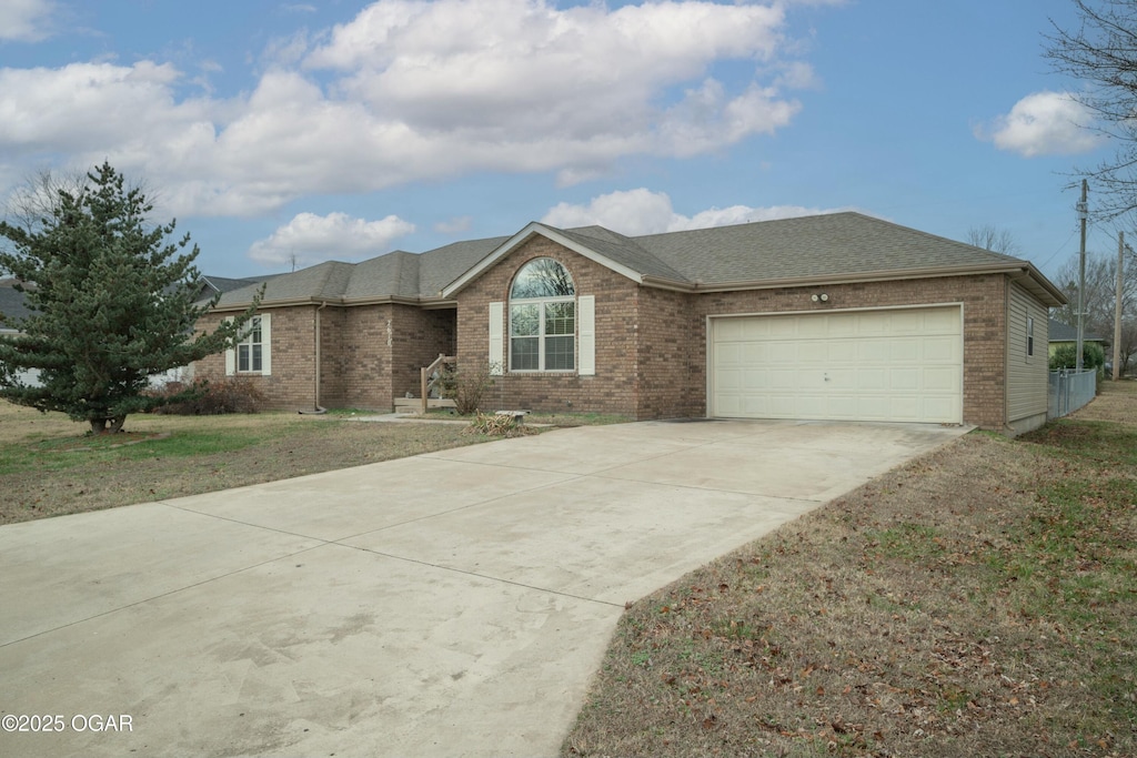 single story home with a garage