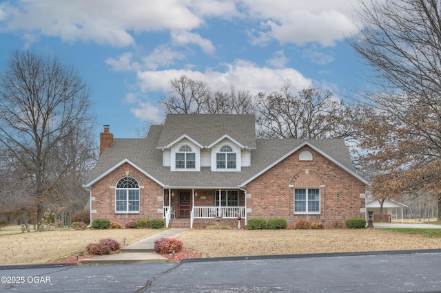 view of front property featuring covered porch