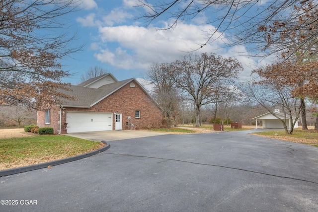 view of property exterior with a garage