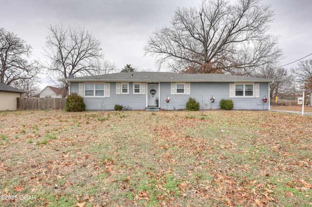 ranch-style house with a front lawn