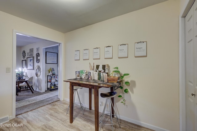 hall featuring light hardwood / wood-style floors