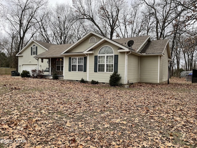 single story home featuring a garage